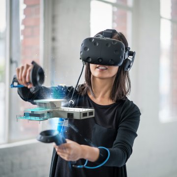 Building a house with virtual reality headset on